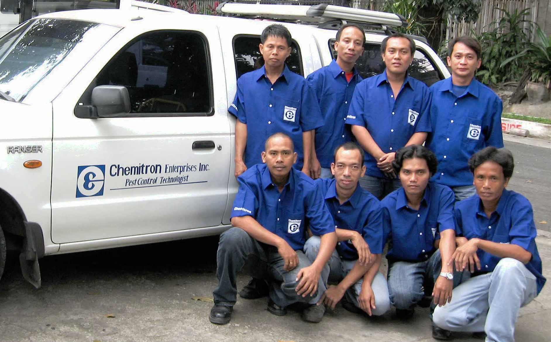 Chemitron technicians posing with company vehicle